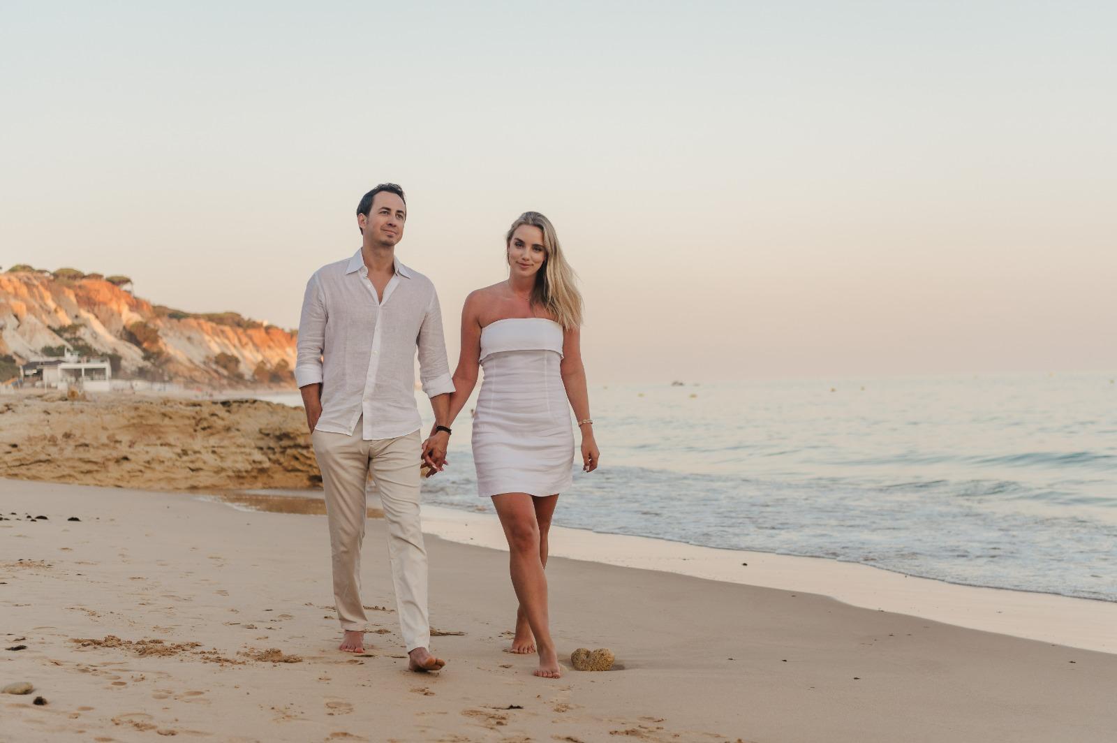 Axel and Katharina walking along the beach